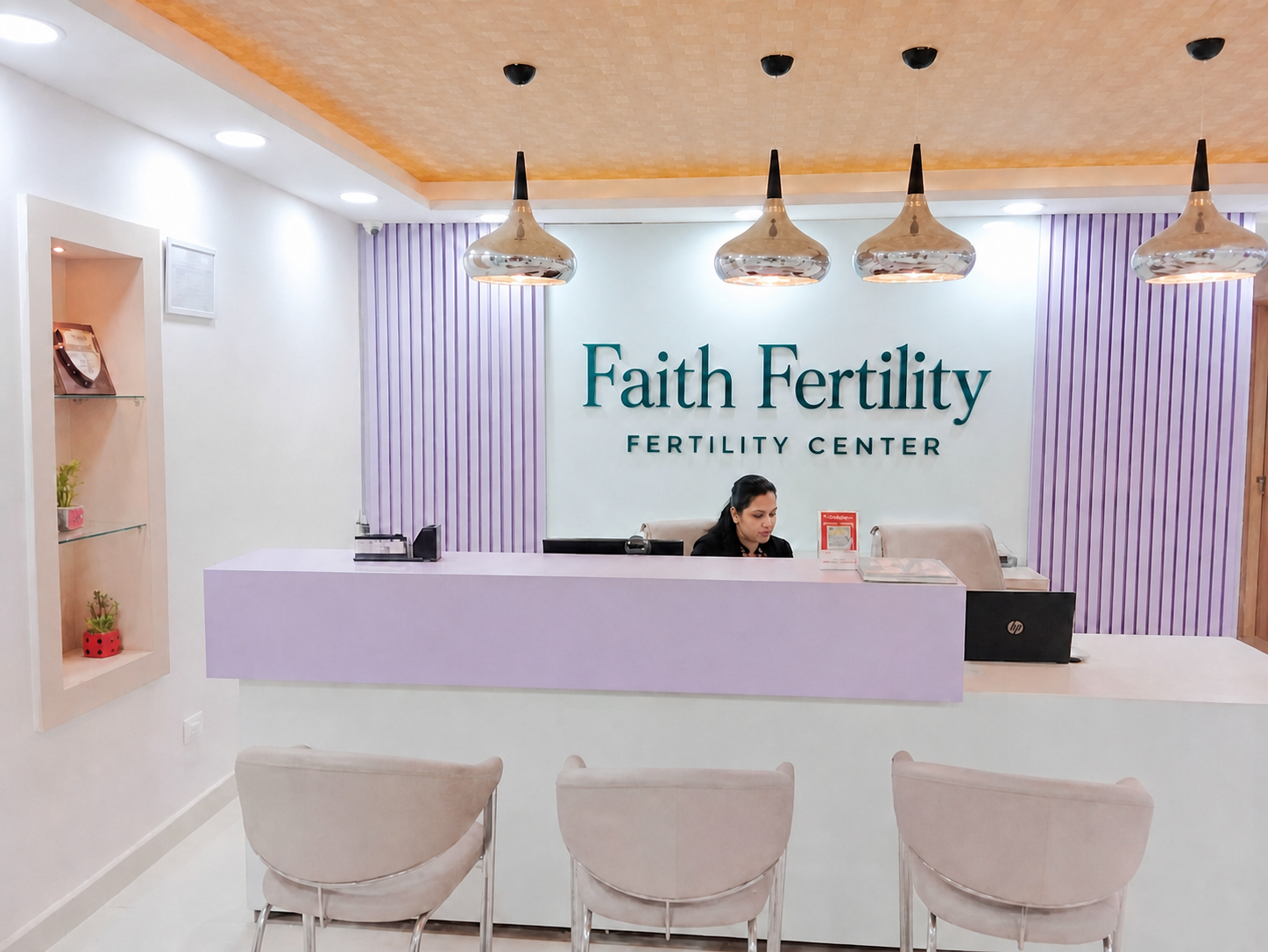 Faith Fertility Center reception with branded wall signage