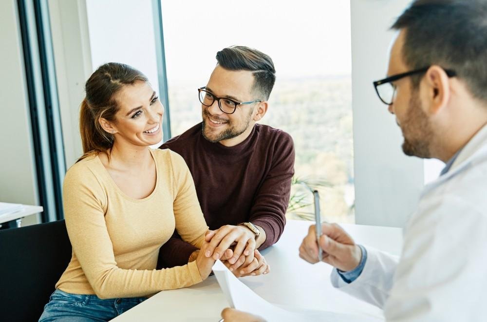A fertility specialist guiding a couple through next steps